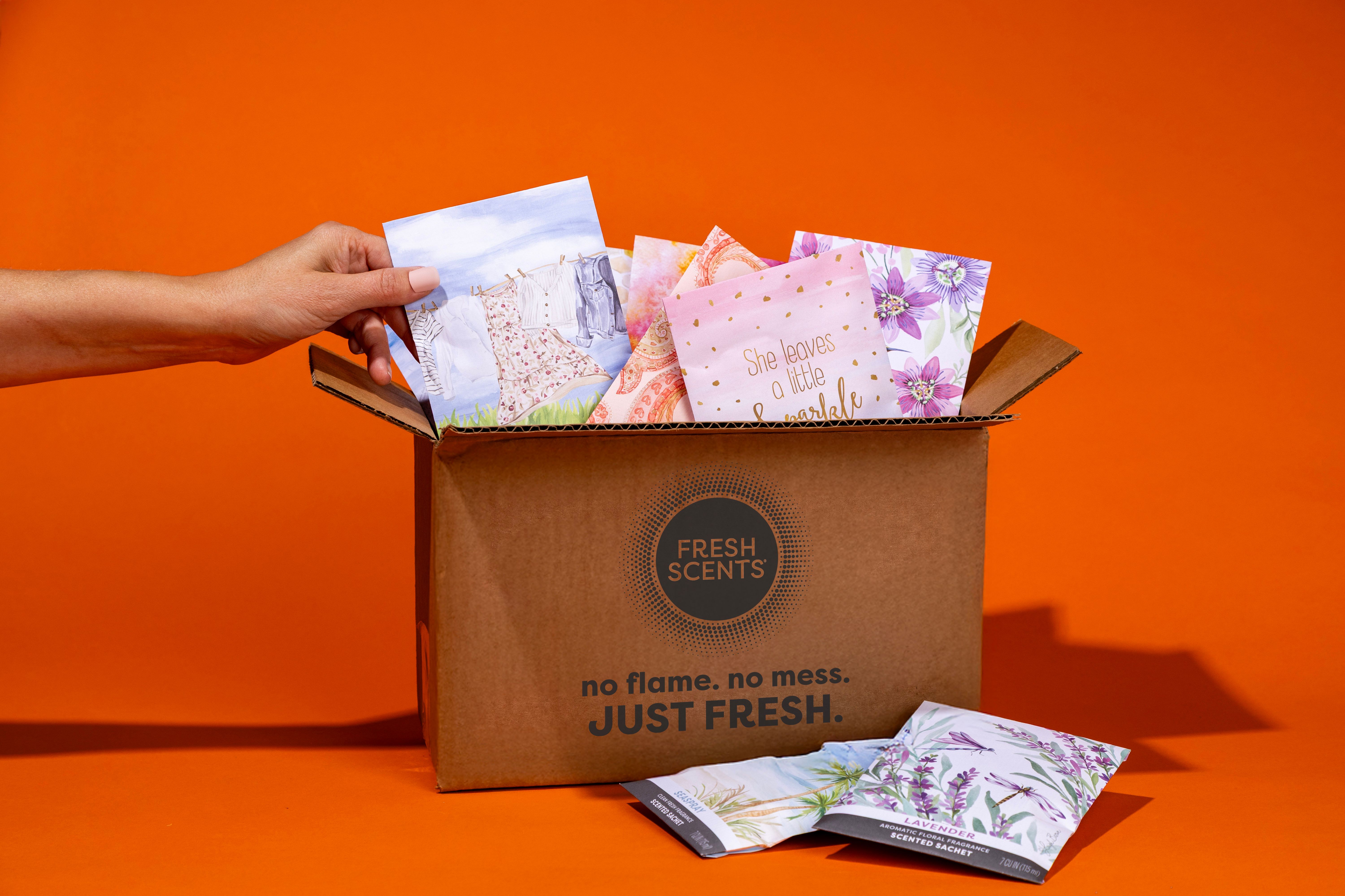  Box of scented sachets on orange background