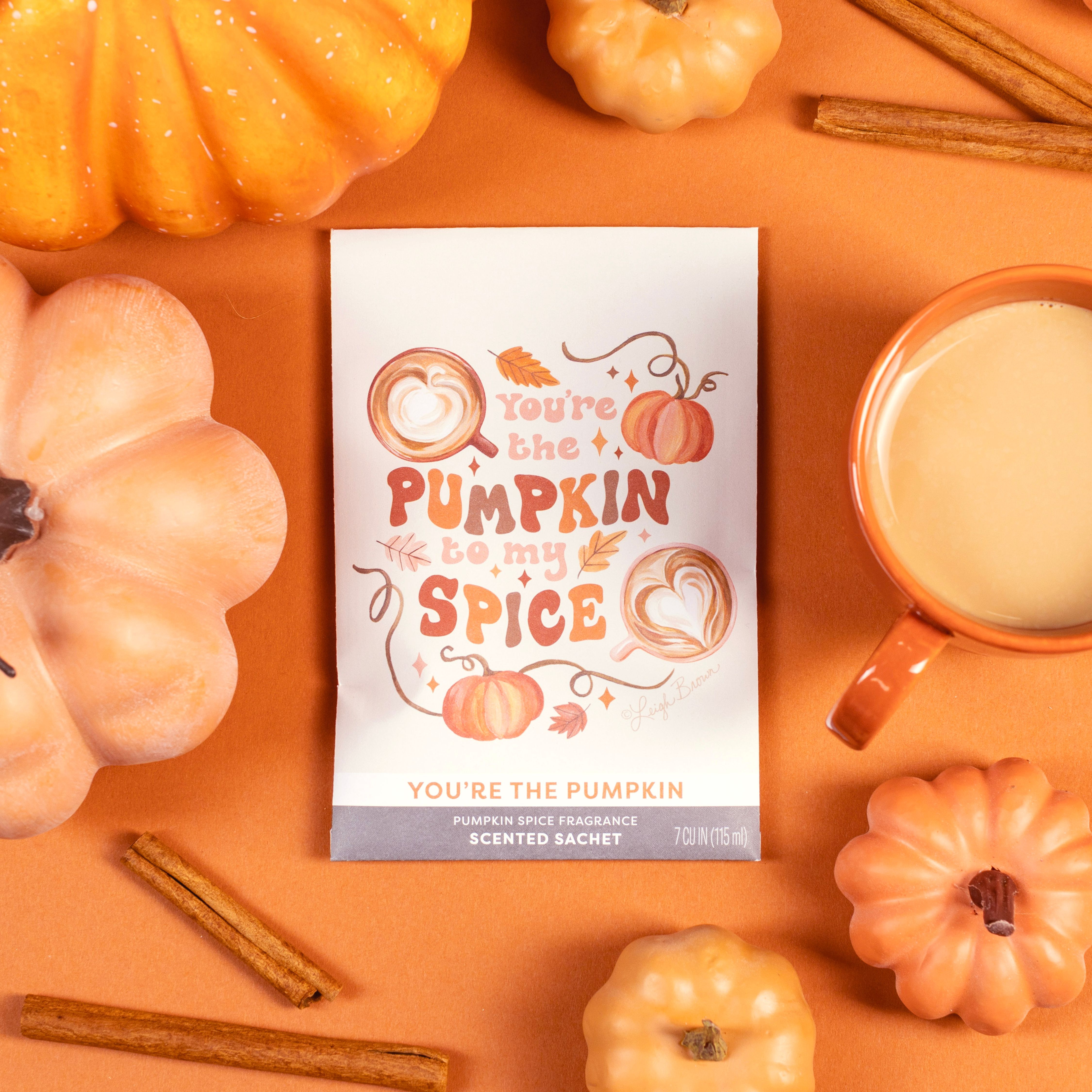 https://retailer.freshscents.com/shop/FSS2001946?productId=FSS2001946&position=-1 You're the Pumpkin sachet on orange background with pumpkins and latte