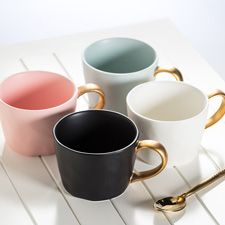 Colourful mugs with gold accent