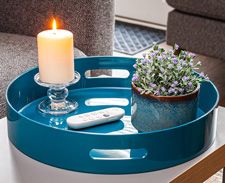Blue round tray with handles and candle