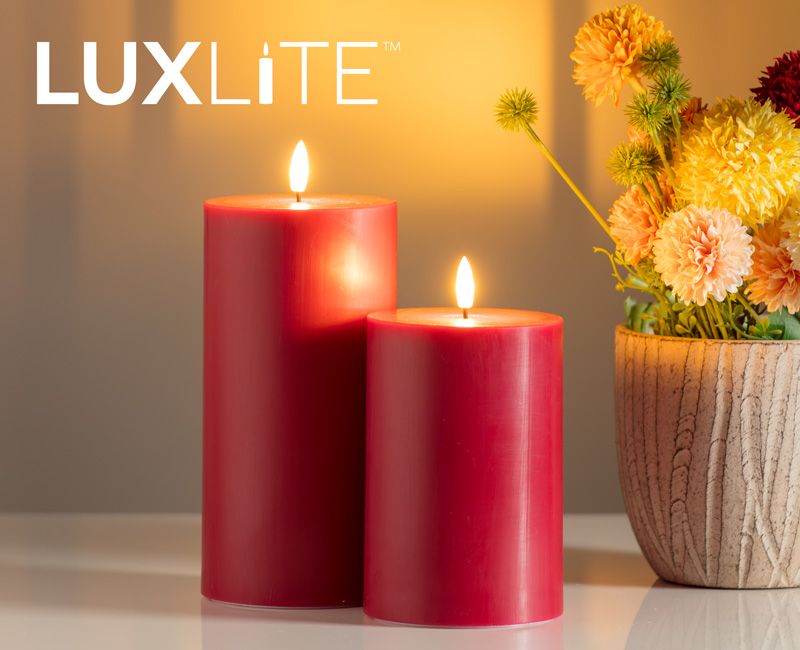 LUXLITE candles on a table