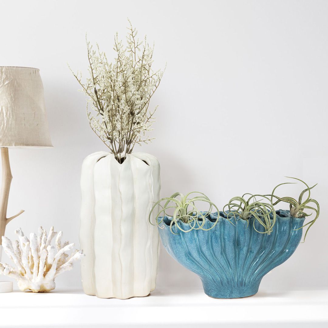 Our handmade, unique organic vase will add nature-inspired elegance to any space! Crafted to mimic the flowing shapes of oceanic life, these captivating items are beautiful as standalone pieces or filled with plants and blooms. 🌊🌊🐚💙🤍⁠