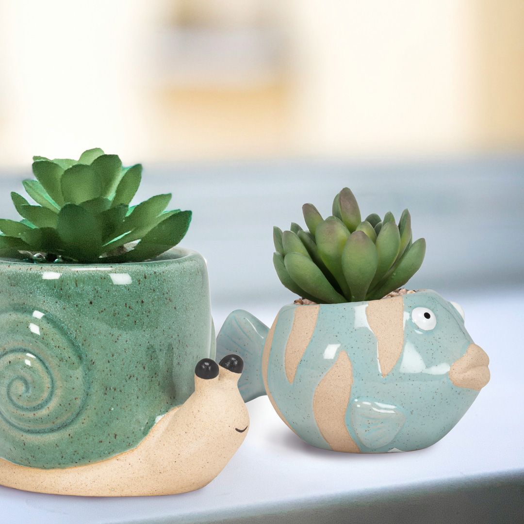 Our adorable mini Animal Planters will add playfulness and charm to small buds and blooms! Crafted from stoneware, these shaped planters have mixed glossy and matte finishes. 🐌🐠🦔🐢⁠