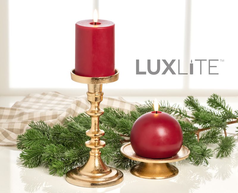 LUXLITE candles on a table