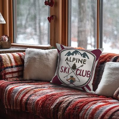 Ski club cushion on couch