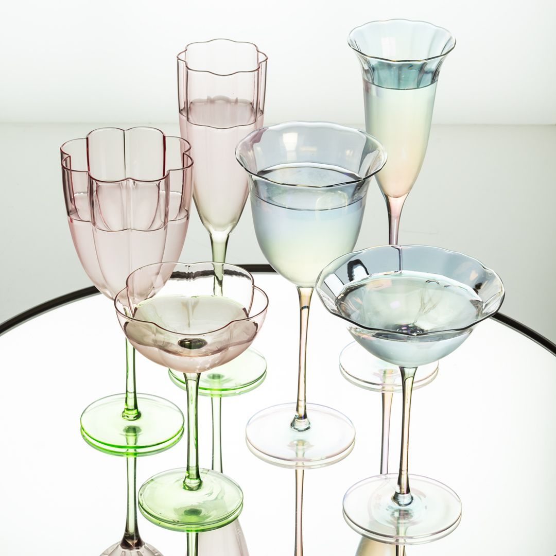 Just in: gorgeous glassware! Start the New Year off right with our new chic and upscale glasses! Shaped like flowers or with a rainbow tint, these stylish pieces are both unique and elegant. 🌷🌈🌼⁠