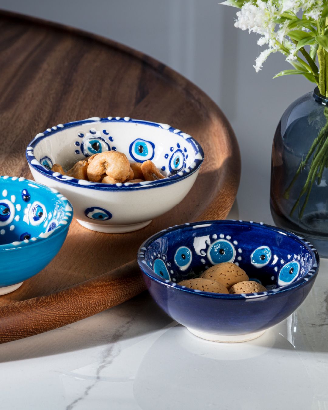 Our colourful mini bowls are hand-painted in Türkiye! Decorated with a punchy floral design, these bright and handy pieces are perfect for sauces, dips, snacks and more. 💙🤍💚🧡⁠