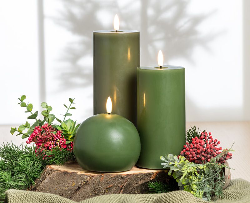 LUXLITE candles on a table