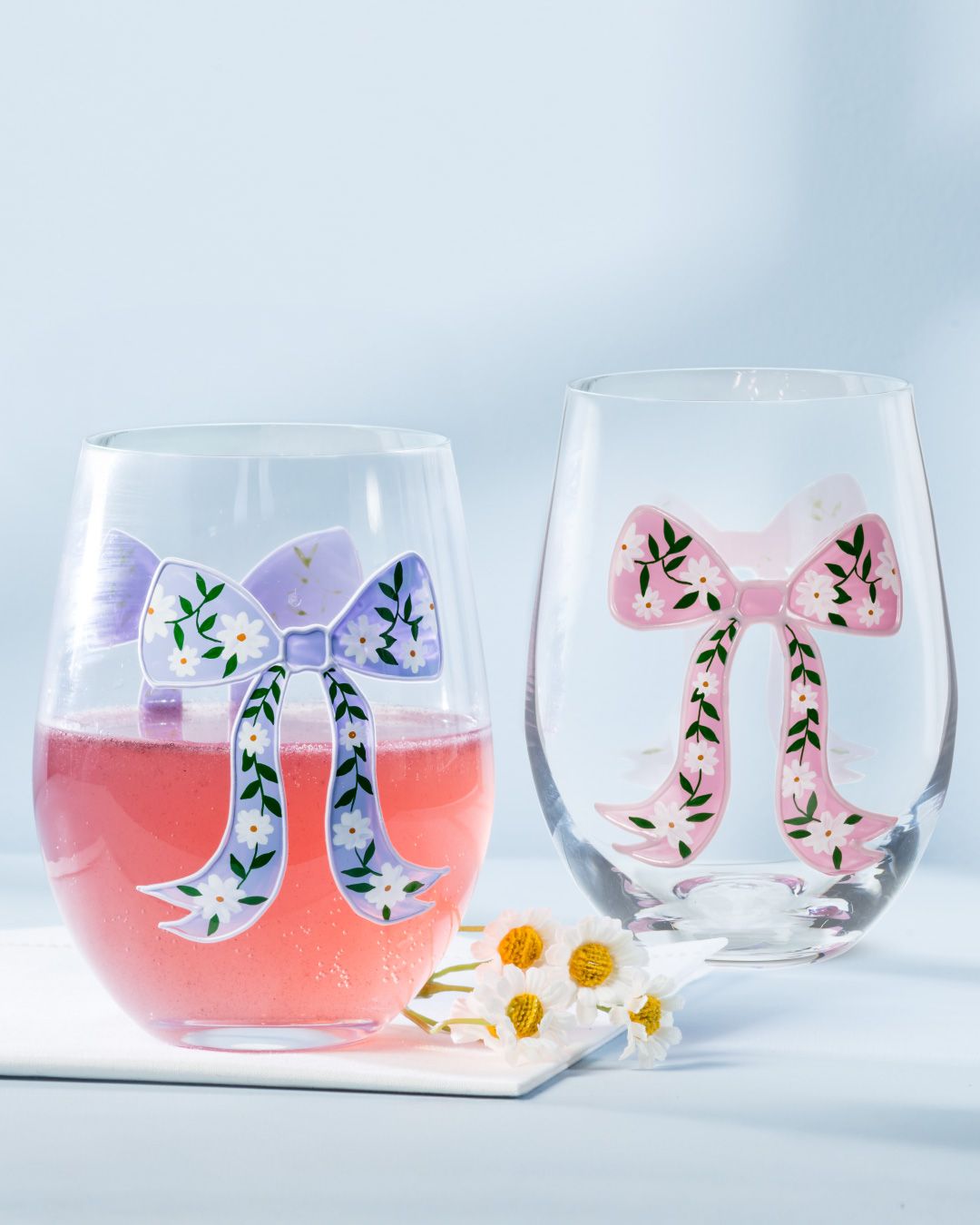 Put a bow on it! Celebrate Mom on May 10 with glassware and table accents adorned in delicate ribbon details. Hand-painted touches and pretty trays add a feminine finish to every sip and setting. #mothersday 🎀🎀🎀⁠ ⁠