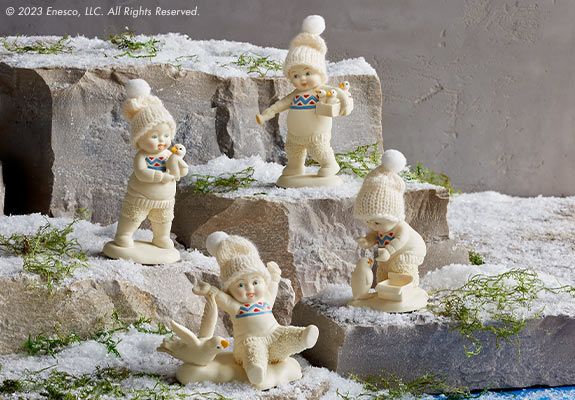Snowbabies Figurines on Rocks