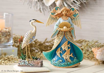 Jim Shore bird and angel figurine 