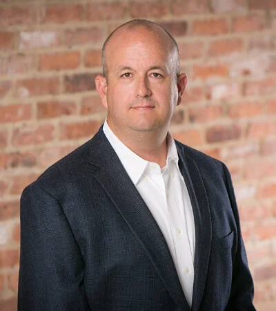 JOE BOWER, Chief Operating Officer