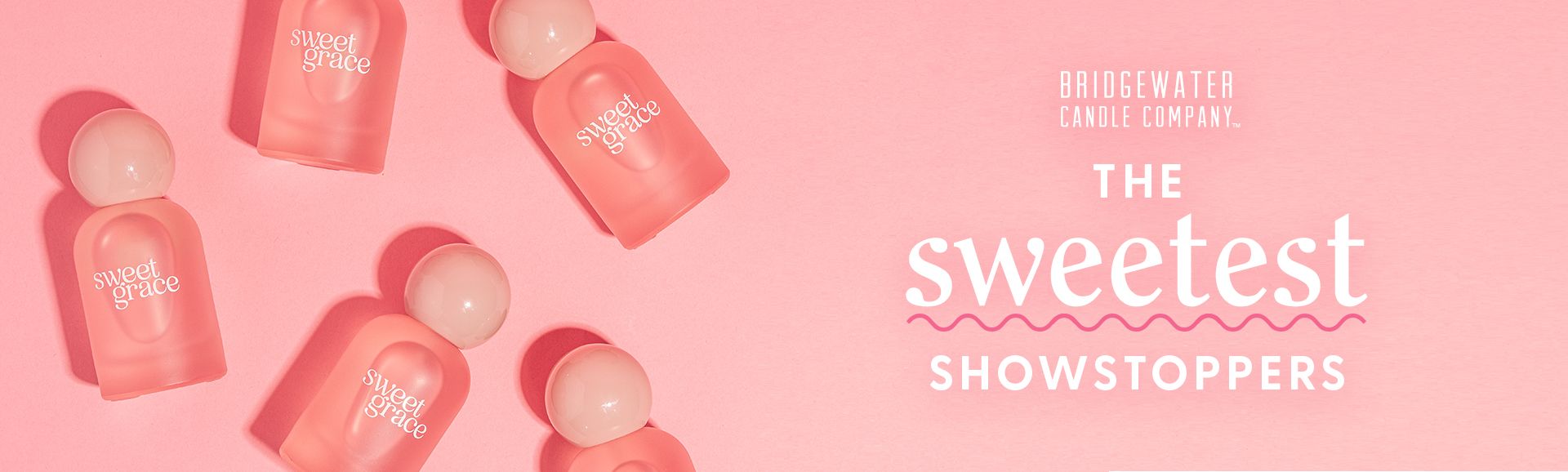 Photo of Bridgewater Candle Sweet Grace Perfume Reading The Sweetest Showtoppers on Pink Background