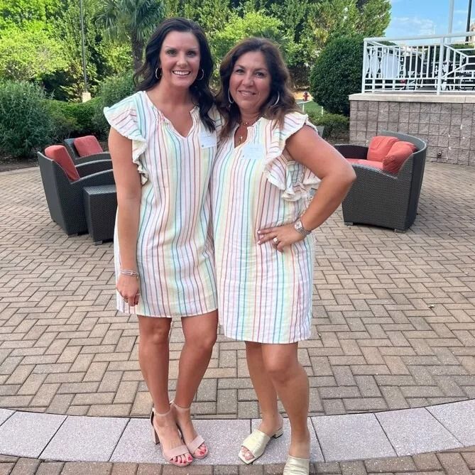 Two people in matching outfits