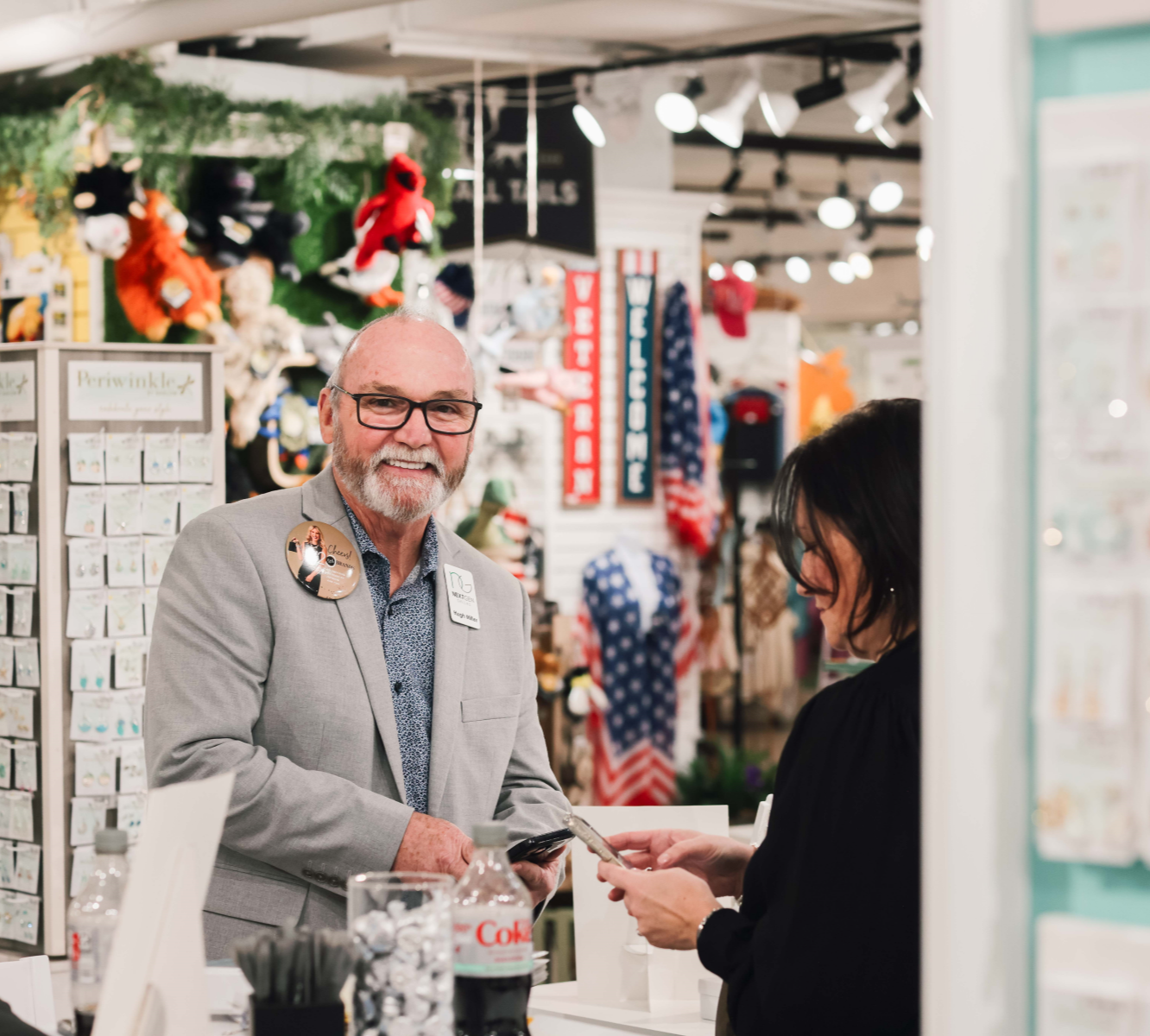 Man smiling while checking out