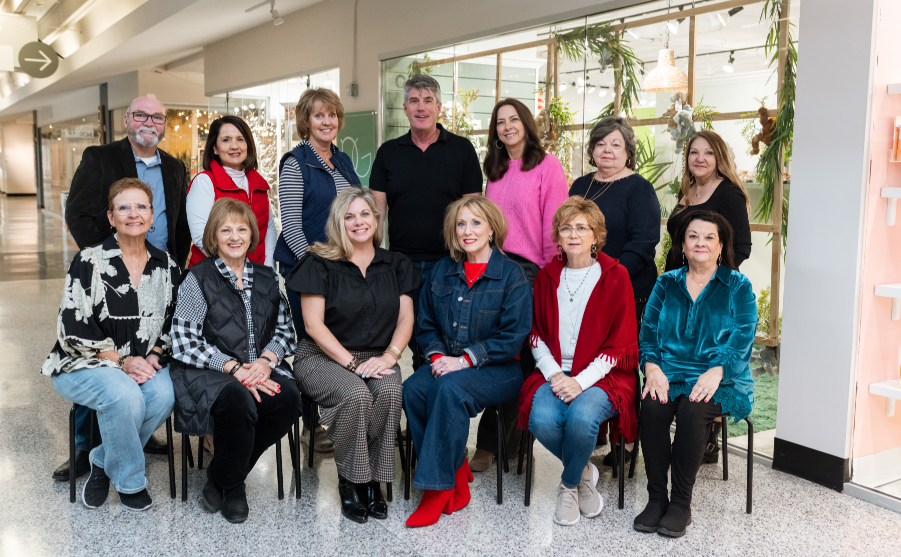 Thirteen rep managers posing for picture